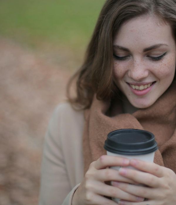 Woman with closed eyes enjoying a moment of calm and peace